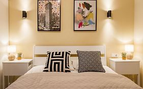Experience City Nightlife From A Sleek Lavish Pad